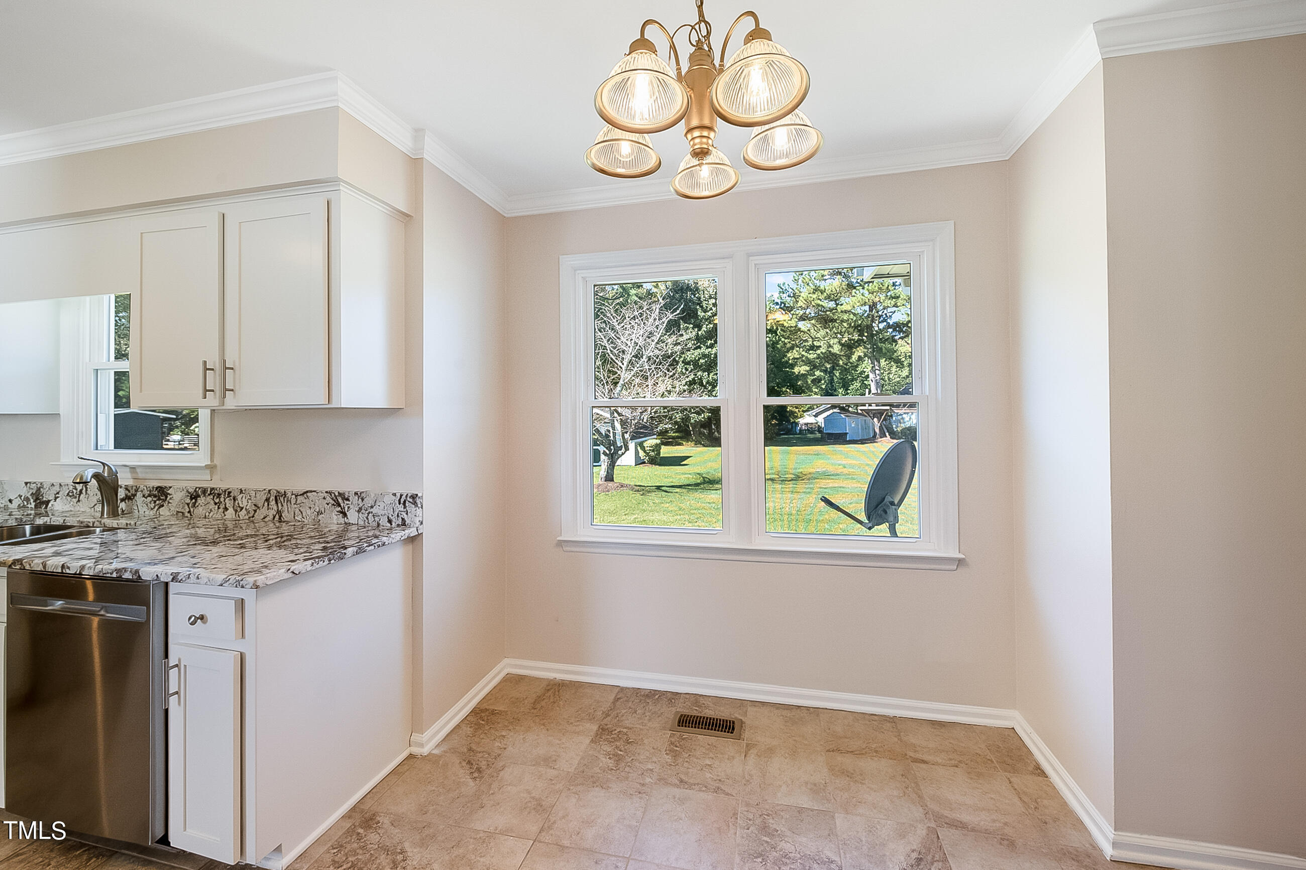 10024 Joe Leach Road Raleigh, NC 27603 - Photo 19 of 26 a view of a kitchen with a window