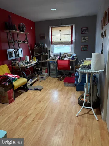 a room with furniture and gym equipment