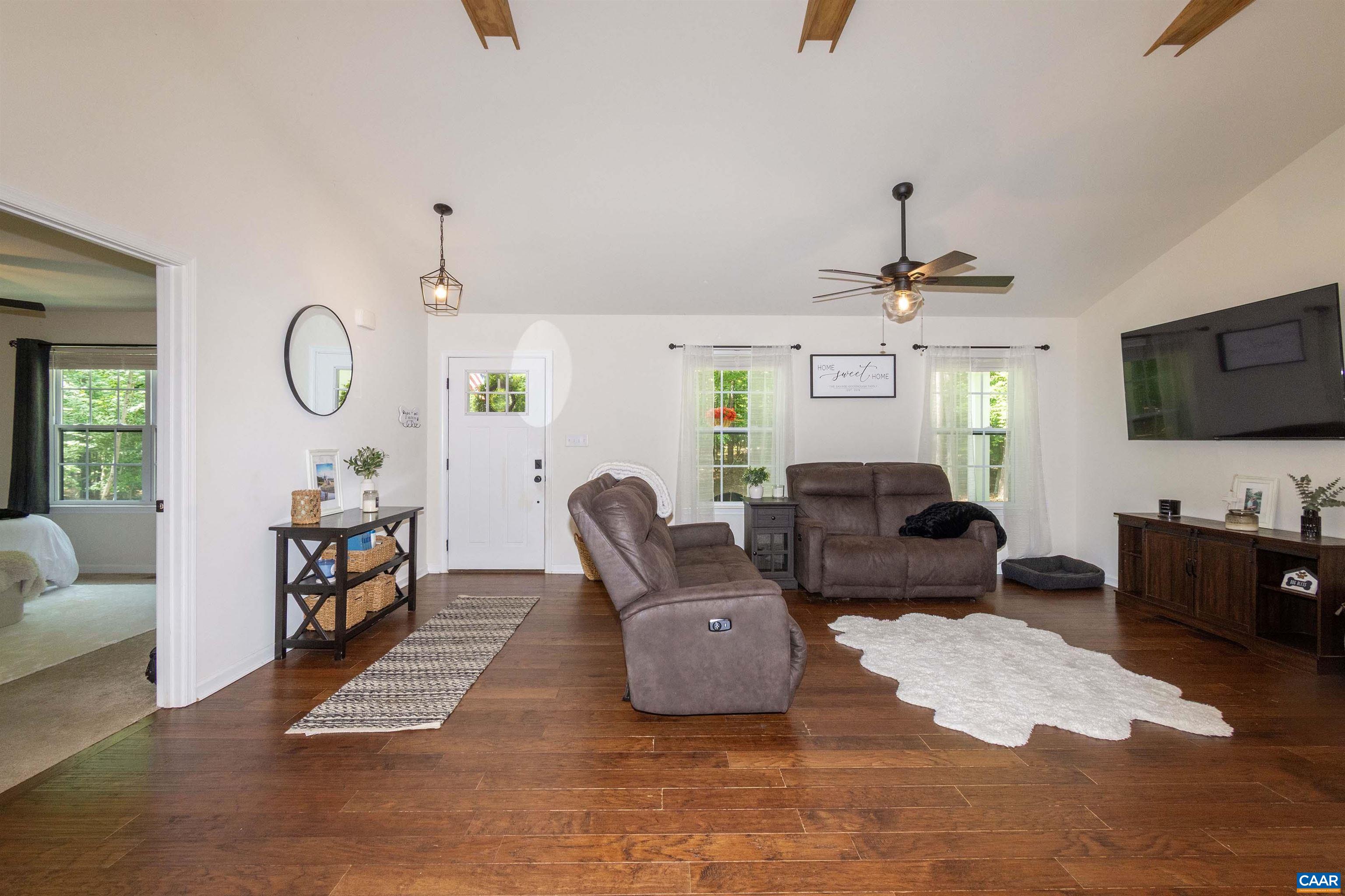 13079 Kendall Road Orange, VA 22960 - Photo 6 of 57 with vaulted ceiling and wide plank flooring.