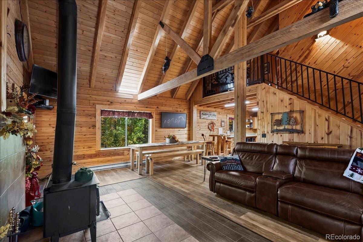 1119 Venture Road Fairplay, CO 80440 - Photo 13 of 49 a living room with furniture and a large window