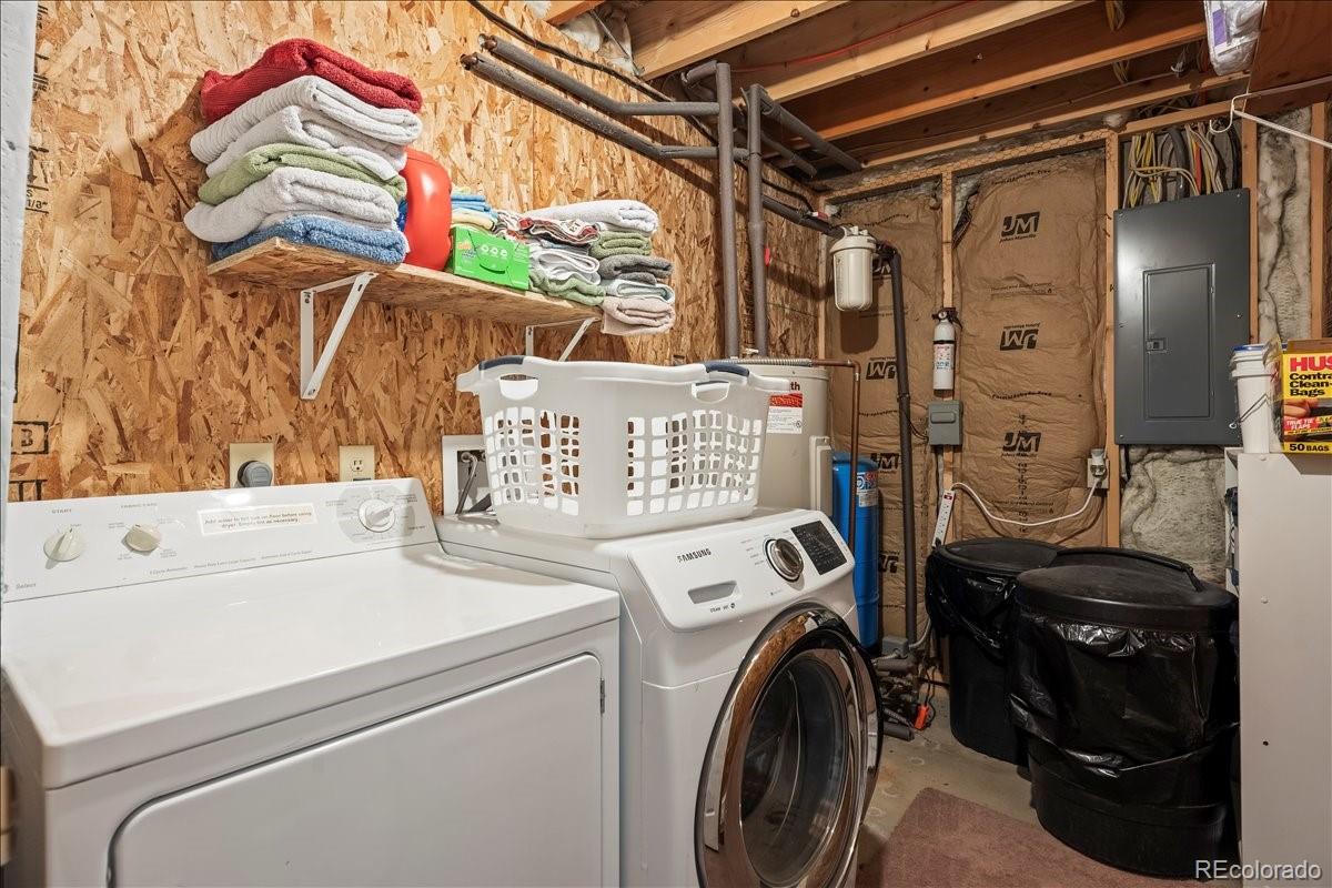 1119 Venture Road Fairplay, CO 80440 - Photo 37 of 49 a utility room with dryer and washer