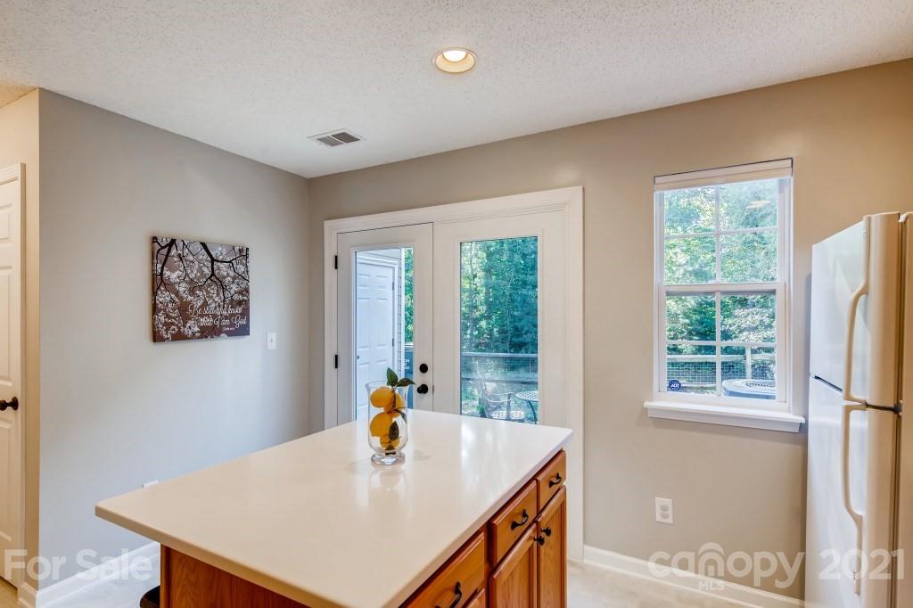 8210 Rudolph Road Charlotte, NC 28216 - Photo 5 of 11 a view of table and chair in a room