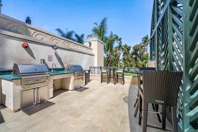 a view of a balcony with chairs