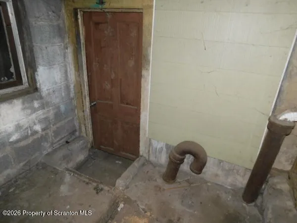 a view of storage and utility room