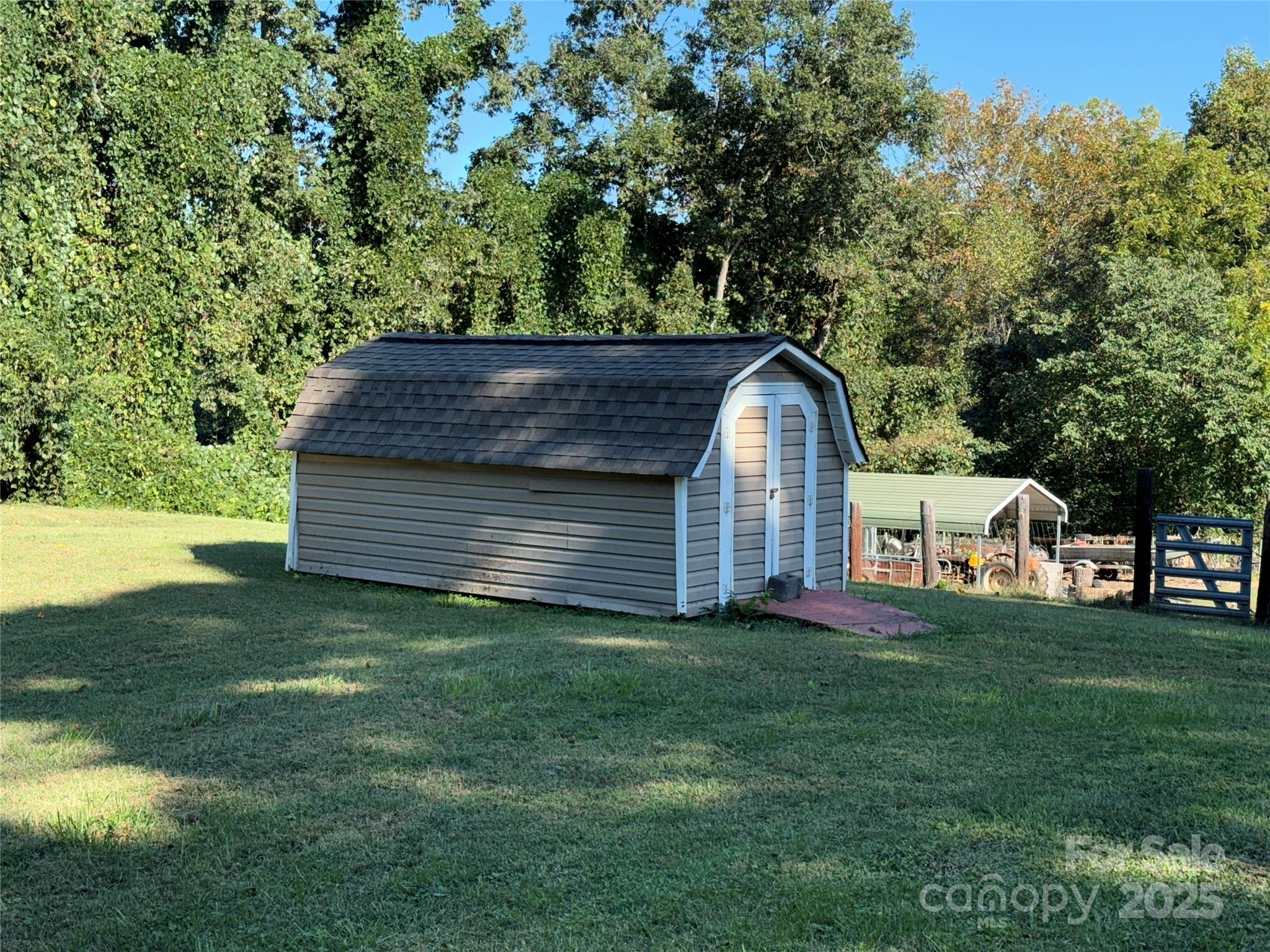 602 Green Chapman Road Gastonia, NC 28056 - Photo 10 of 10 a view of a house with a yard