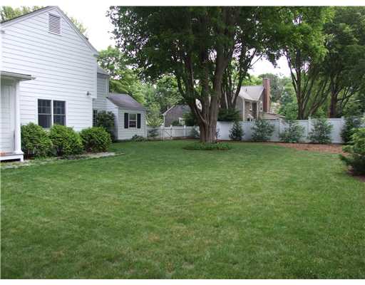 6 Ronald Road Barrington, RI 02806 - Photo 11 of 12 Exterior Back. Private fenced back yard edged with bountiful perennial gardens is an outdoor lover s paradise.