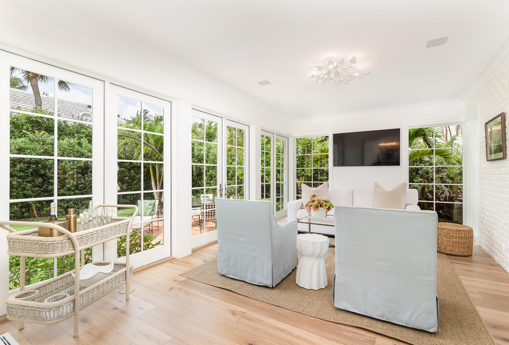 236 Pendleton Avenue Palm Beach, FL 33480 - Photo 15 of 34 a living room with furniture and a large window