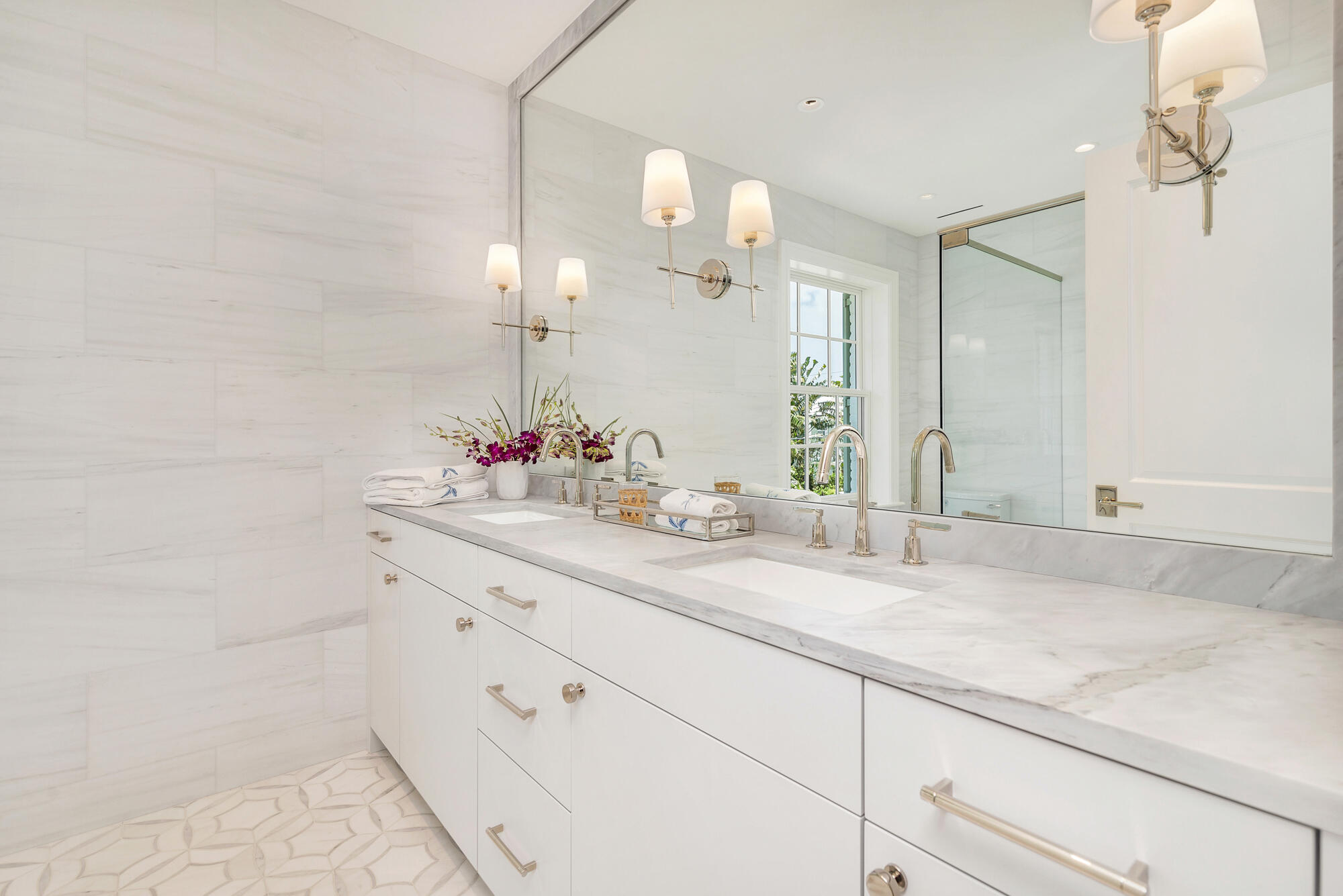236 Pendleton Avenue Palm Beach, FL 33480 - Photo 22 of 34 a bathroom with a sink and a mirror