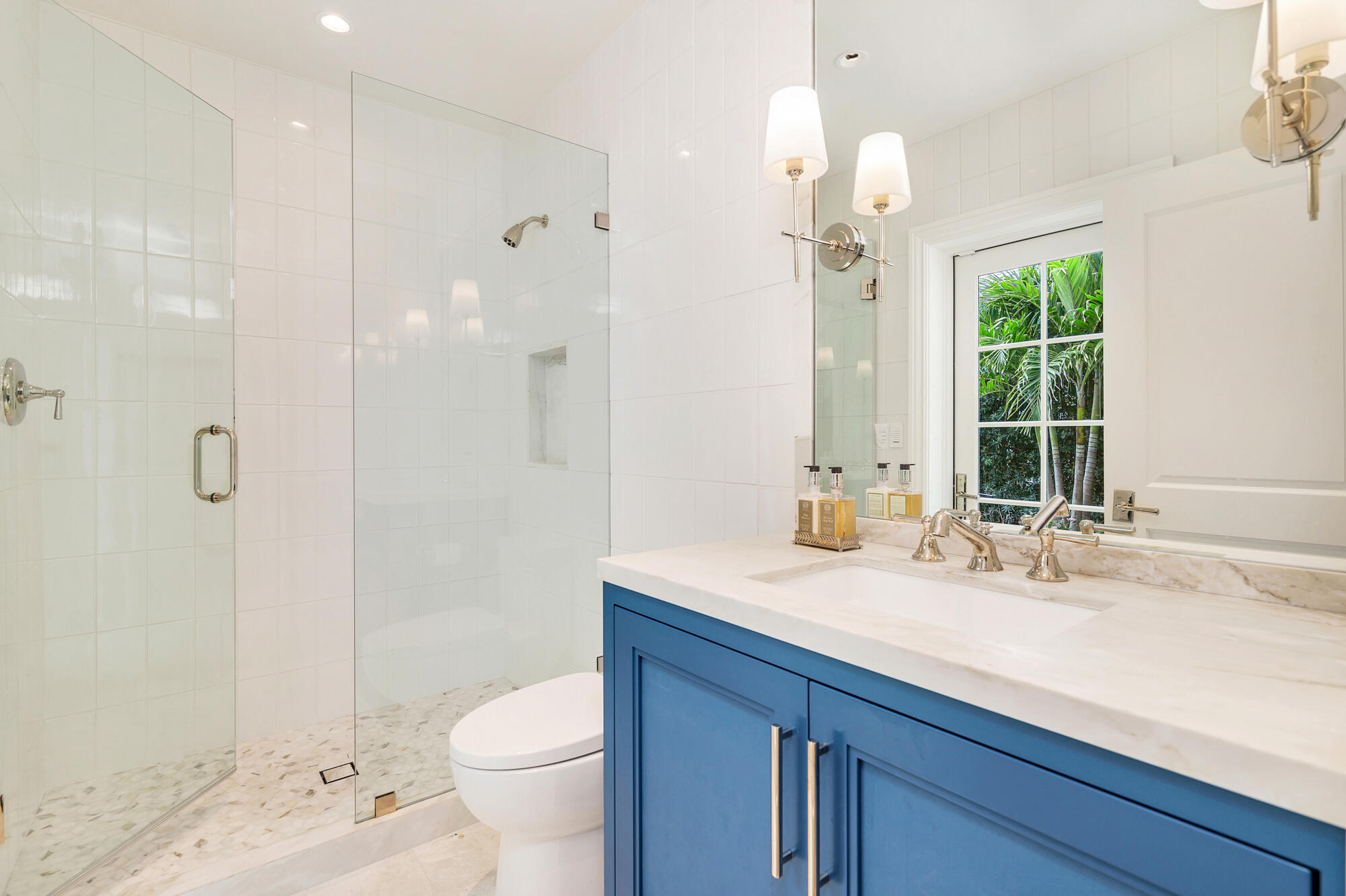 236 Pendleton Avenue Palm Beach, FL 33480 - Photo 30 of 34 a bathroom with a sink a toilet and shower