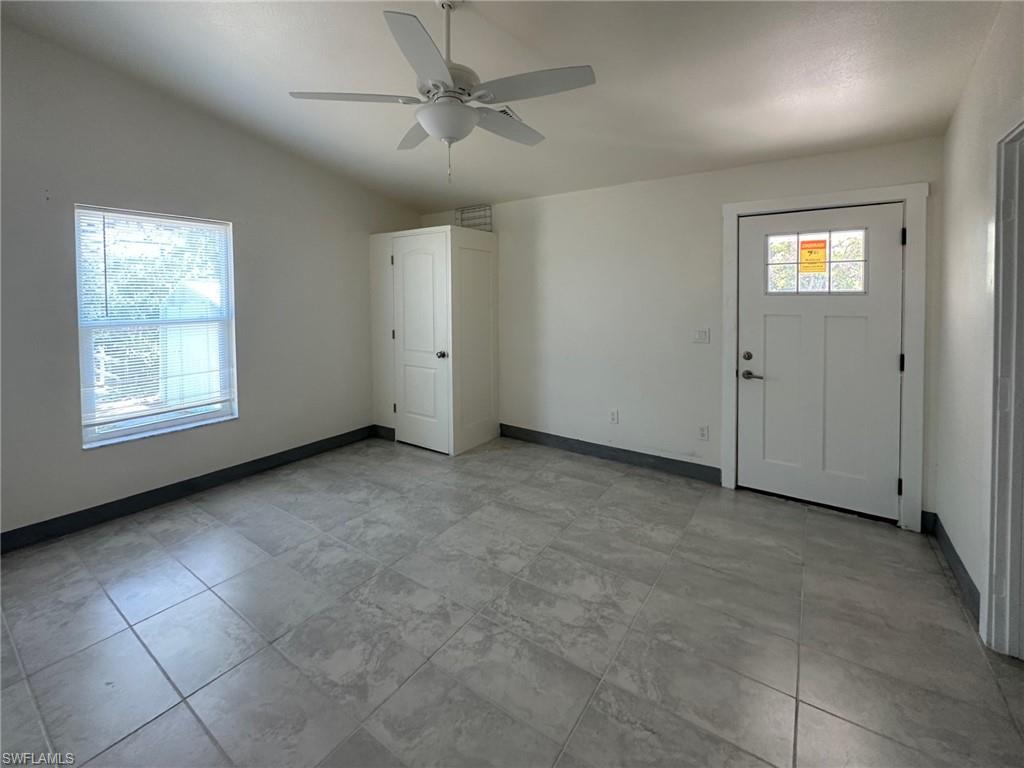 137 Meta Street Fort Myers, FL 33905 - Photo 16 of 50 Entrance foyer with vaulted ceiling and a ceiling fan