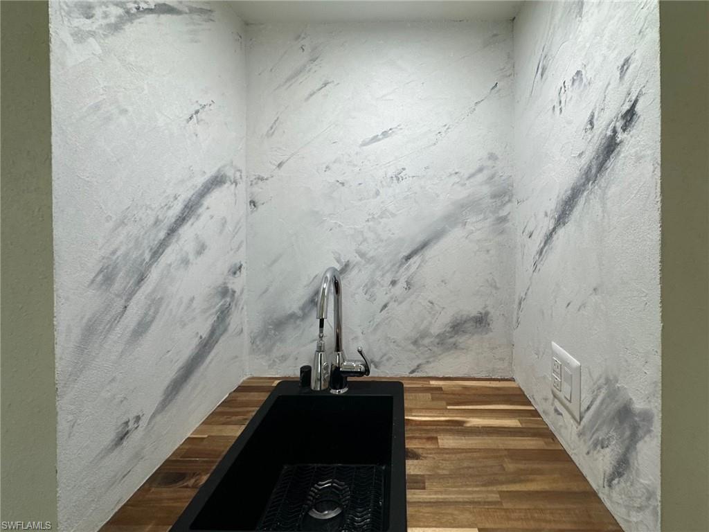 137 Meta Street Fort Myers, FL 33905 - Photo 40 of 50 Detailed view of a sink and wood finished floors