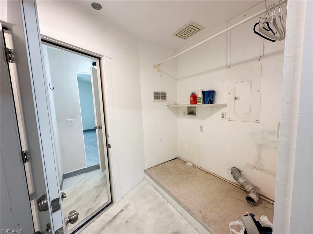 137 Meta Street Fort Myers, FL 33905 - Photo 41 of 50 Laundry area with washer hookup and electric panel