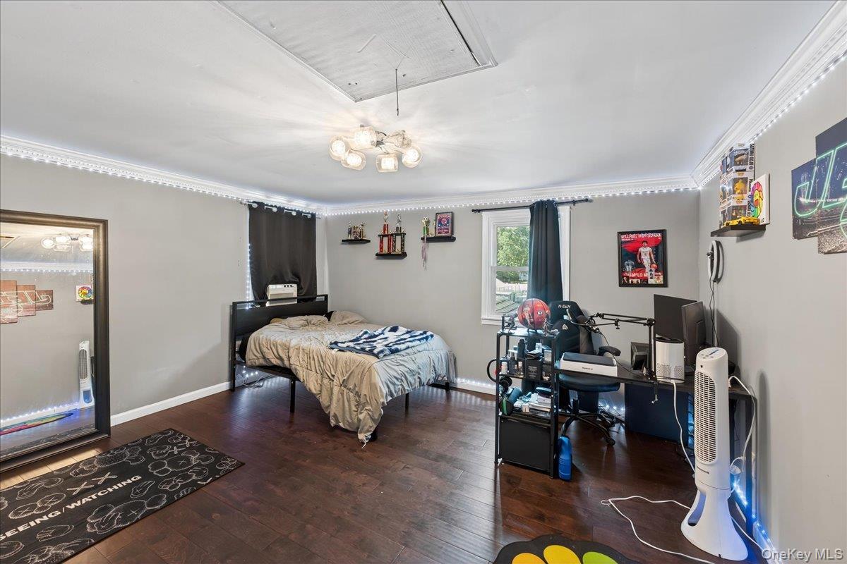 4 Myrtle Lane Coram, NY 11727 - Photo 15 of 20 a living room with furniture and wooden floor