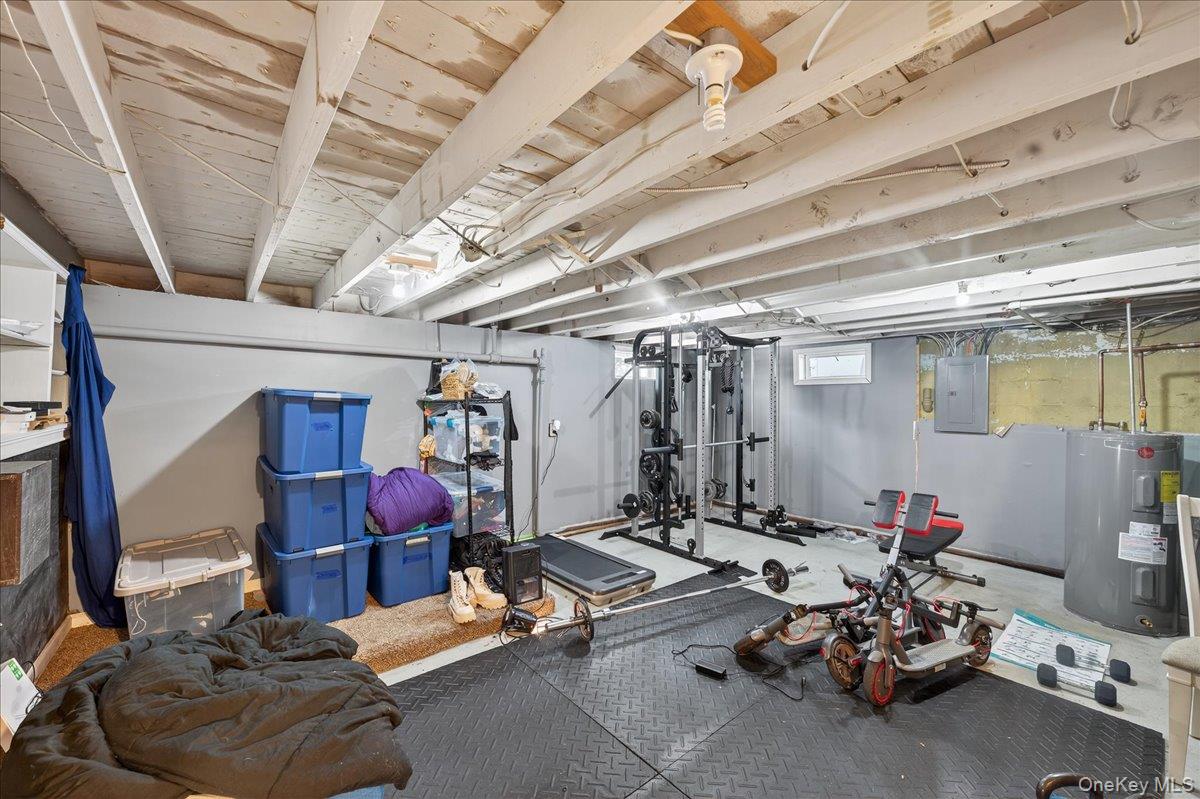 4 Myrtle Lane Coram, NY 11727 - Photo 16 of 20 a room with gym equipment