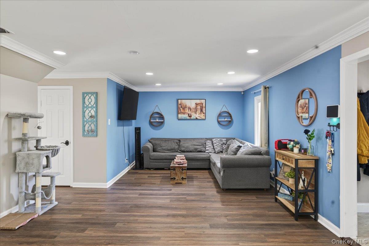 4 Myrtle Lane Coram, NY 11727 - Photo 6 of 20 a living room with furniture and wooden floor