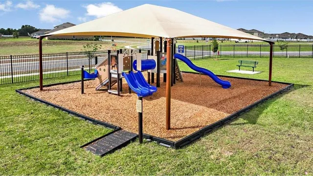 a view of a park with swings