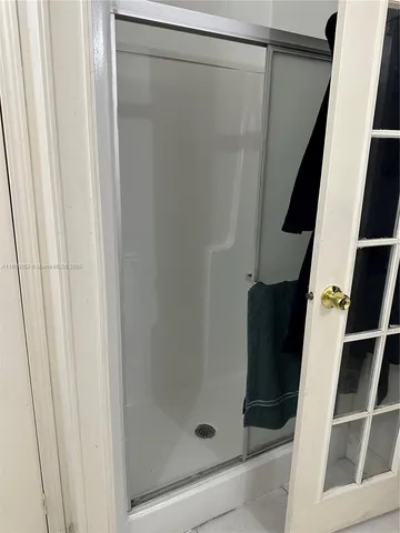 a view of balcony with furniture