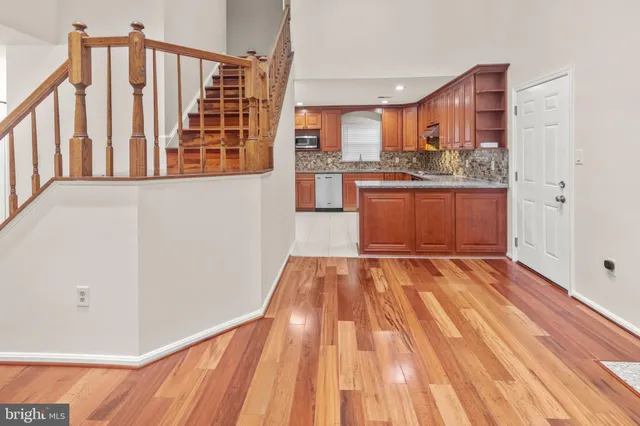 a view of a kitchen from the hallway
