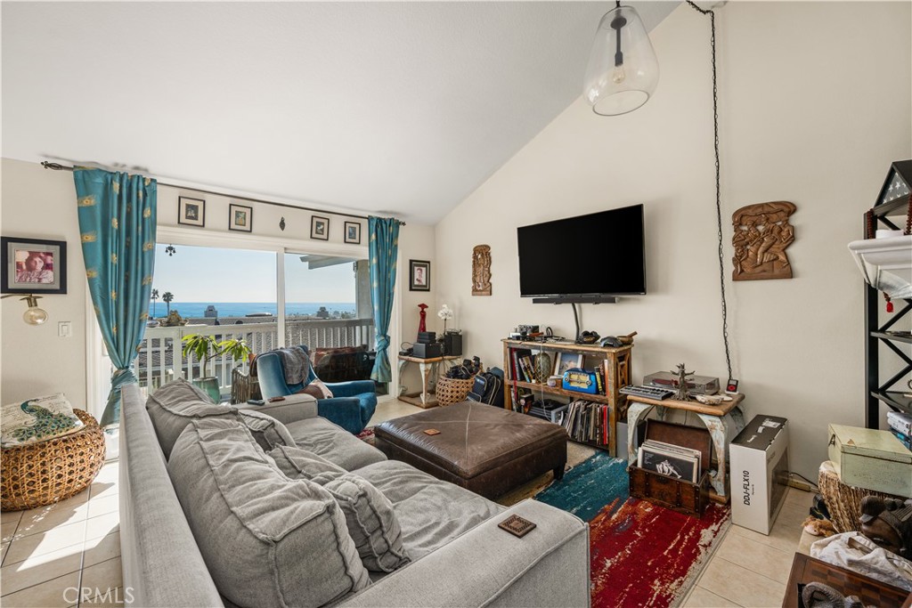 24722 Dana Point Drive Dana Point, CA 92629 - Photo 4 of 17 a living room with furniture and a flat screen tv