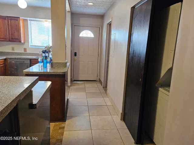 an empty room with glass door