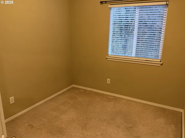 a view of a room with a window