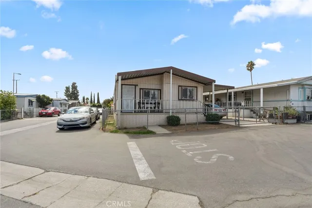 a view of car parked in front of house