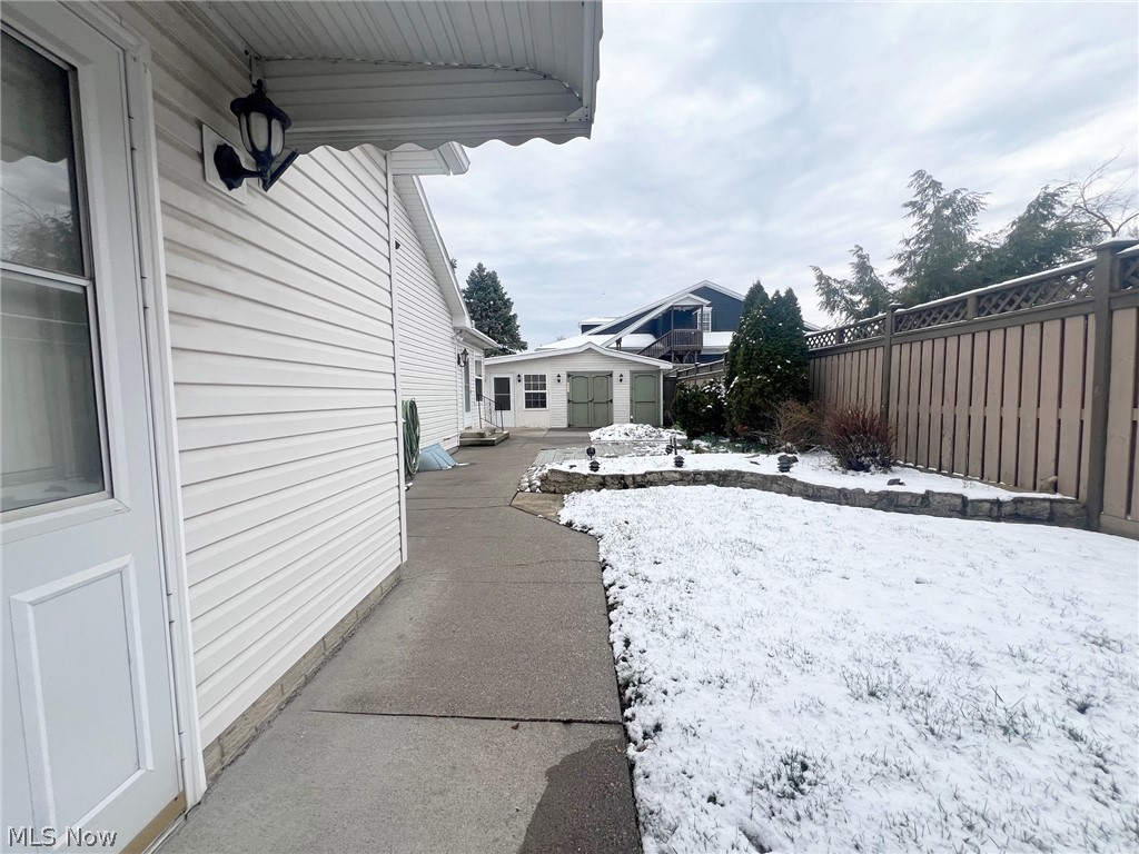 5203 Ridgeland Street Lorain, OH 44055 - Photo 27 of 39 View of snow covered exterior