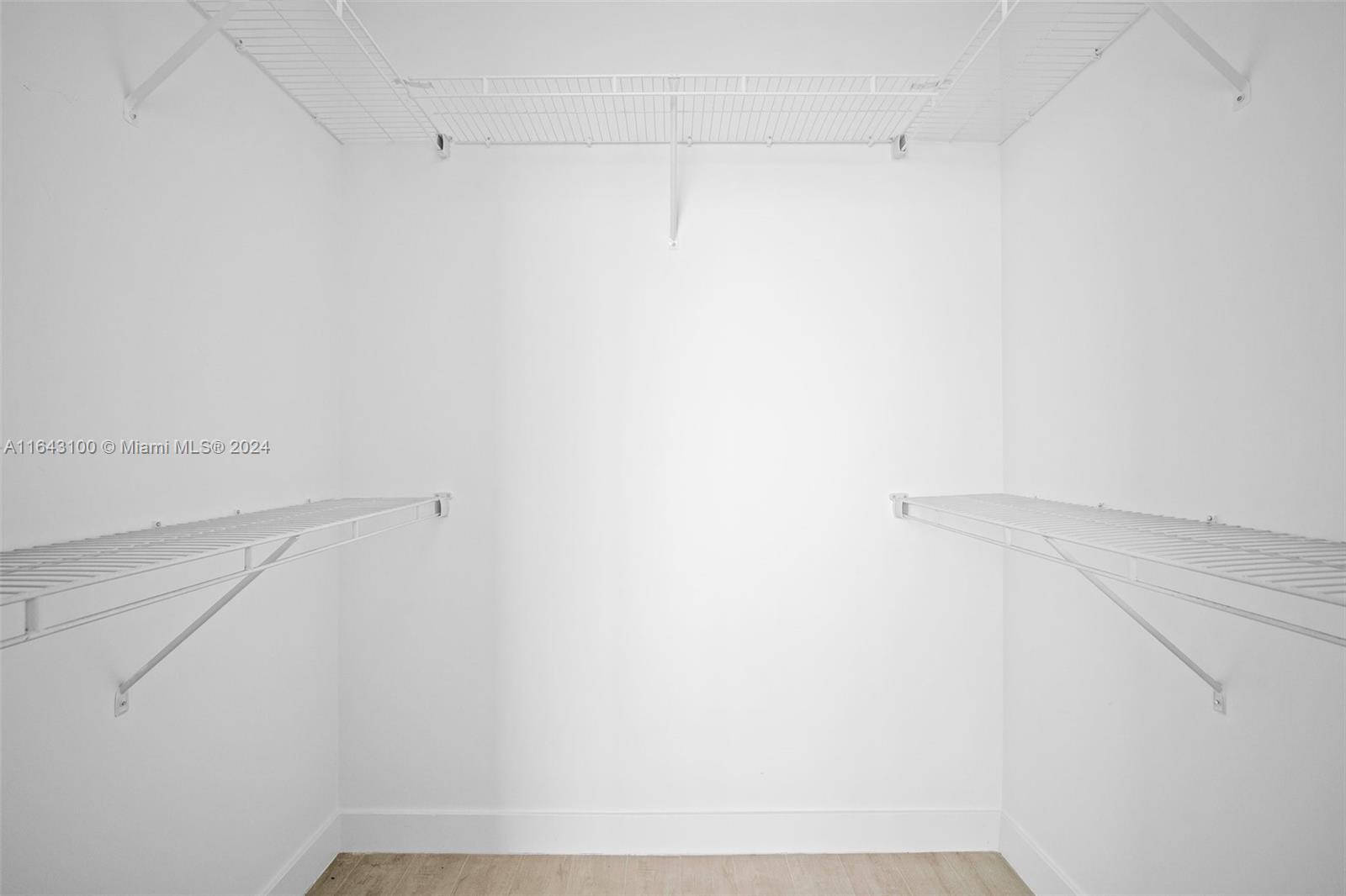 1111 Southwest 1st Avenue, Unit 3425N Miami, FL 33130 - Photo 12 of 35 a view of small space with racks on the wall