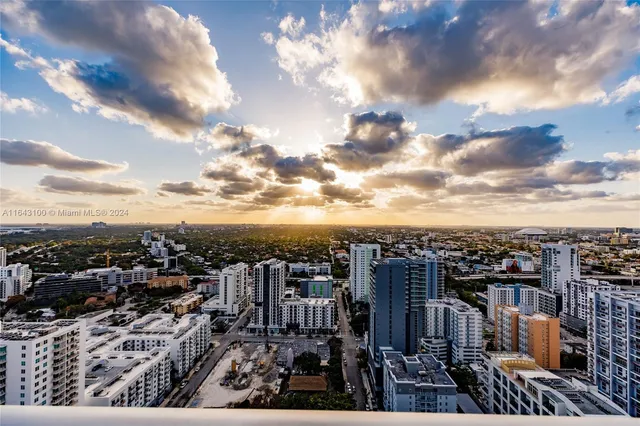 a view of a balcony with city