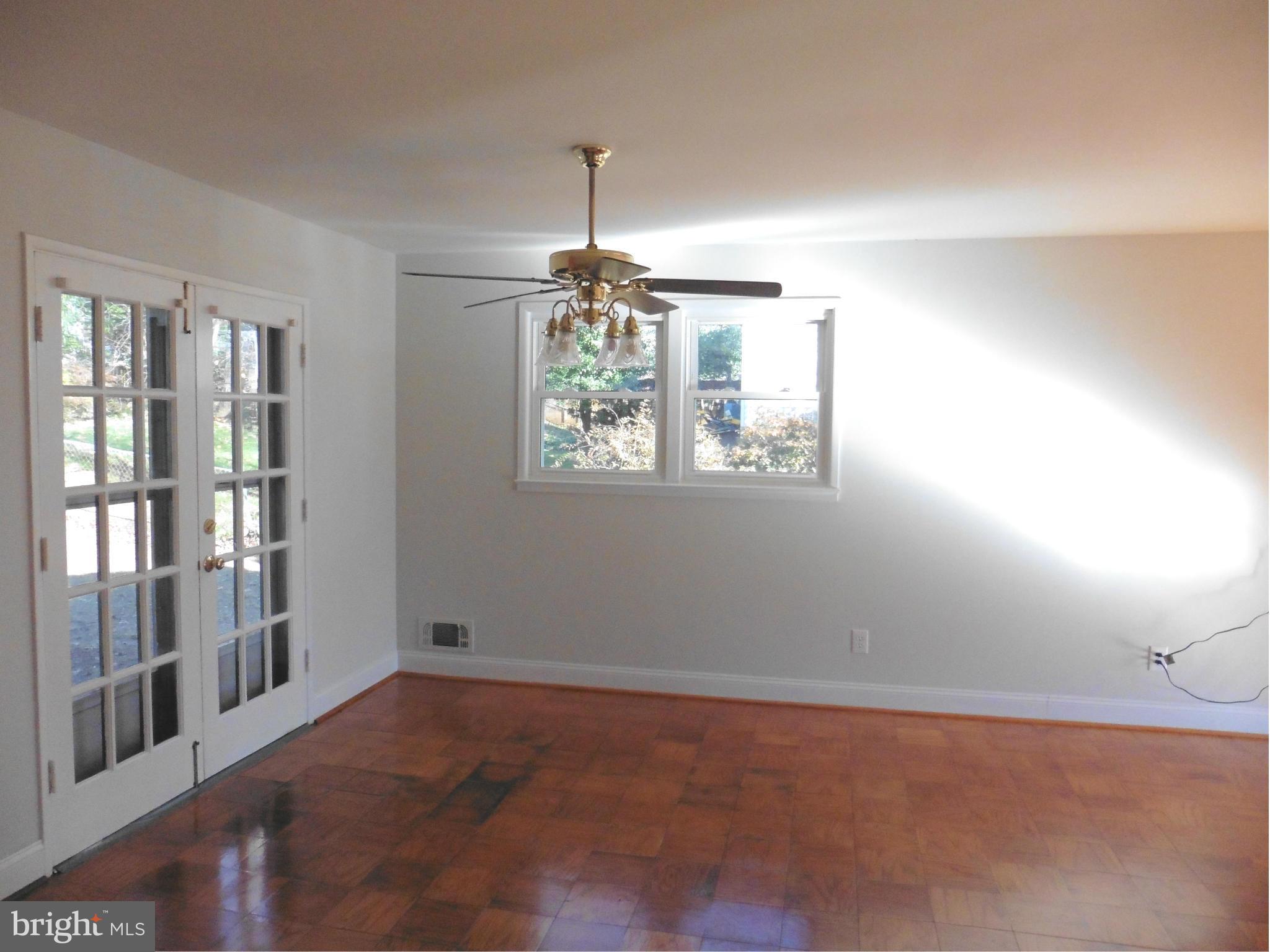 5227 Ravensworth Road Springfield, VA 22151 - Photo 17 of 27 a very nice looking room with windows