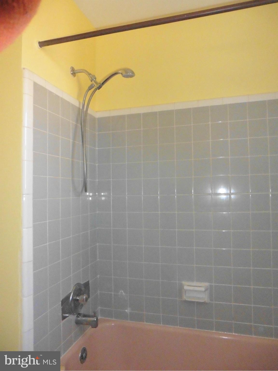 5227 Ravensworth Road Springfield, VA 22151 - Photo 19 of 27 a bathroom with a shower
