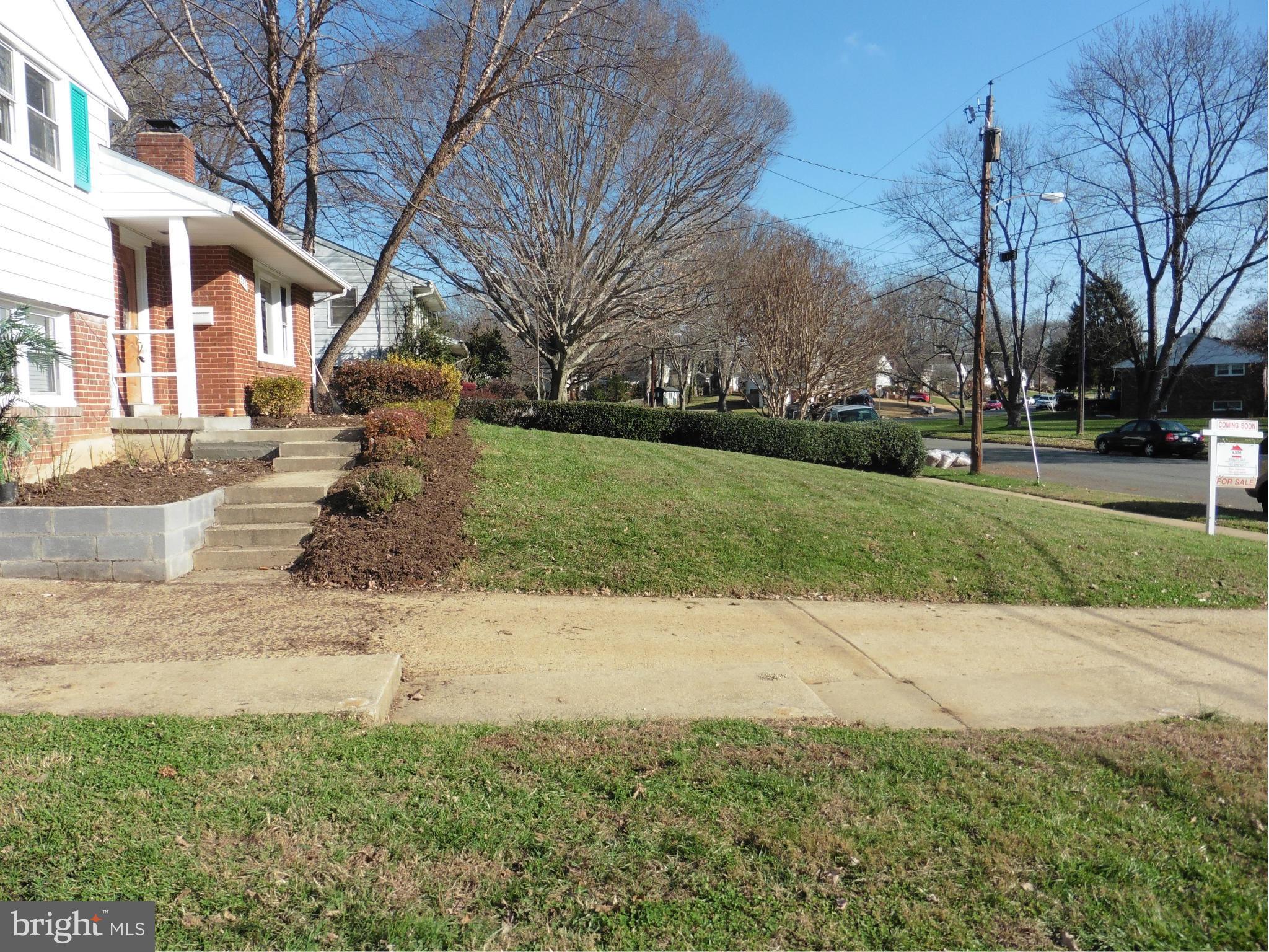 5227 Ravensworth Road Springfield, VA 22151 - Photo 21 of 27 a view of a house with a yard