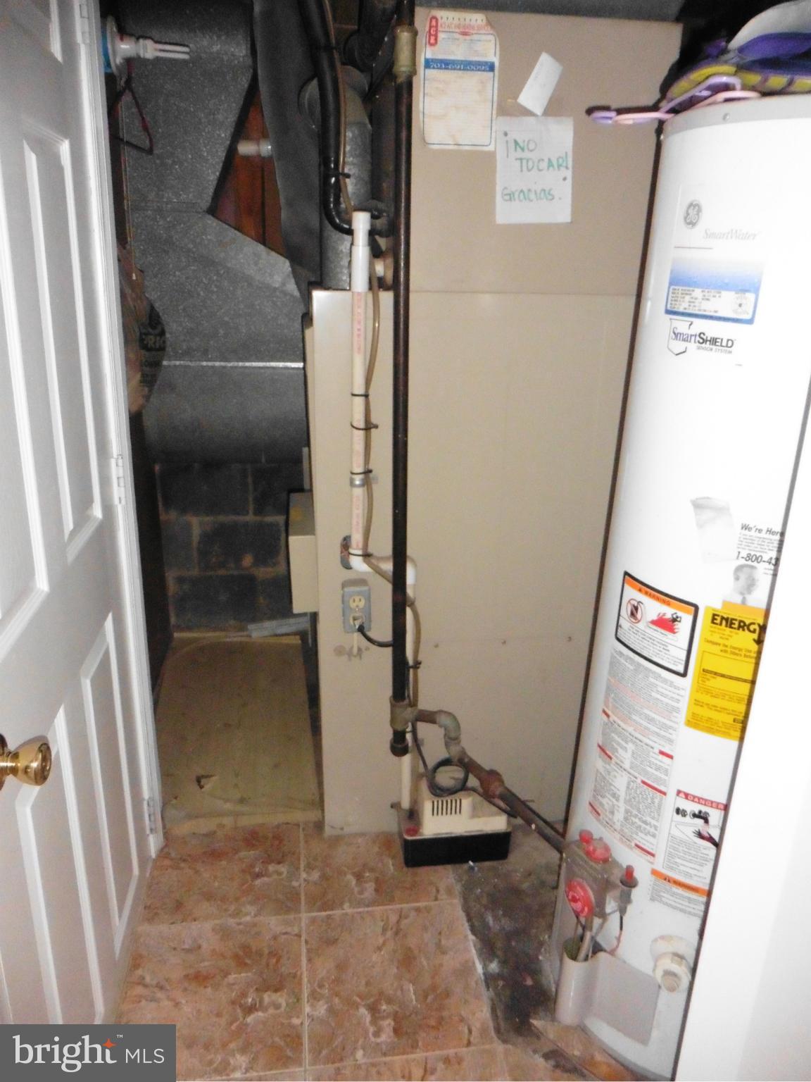 5227 Ravensworth Road Springfield, VA 22151 - Photo 24 of 27 a view of storage and utility room