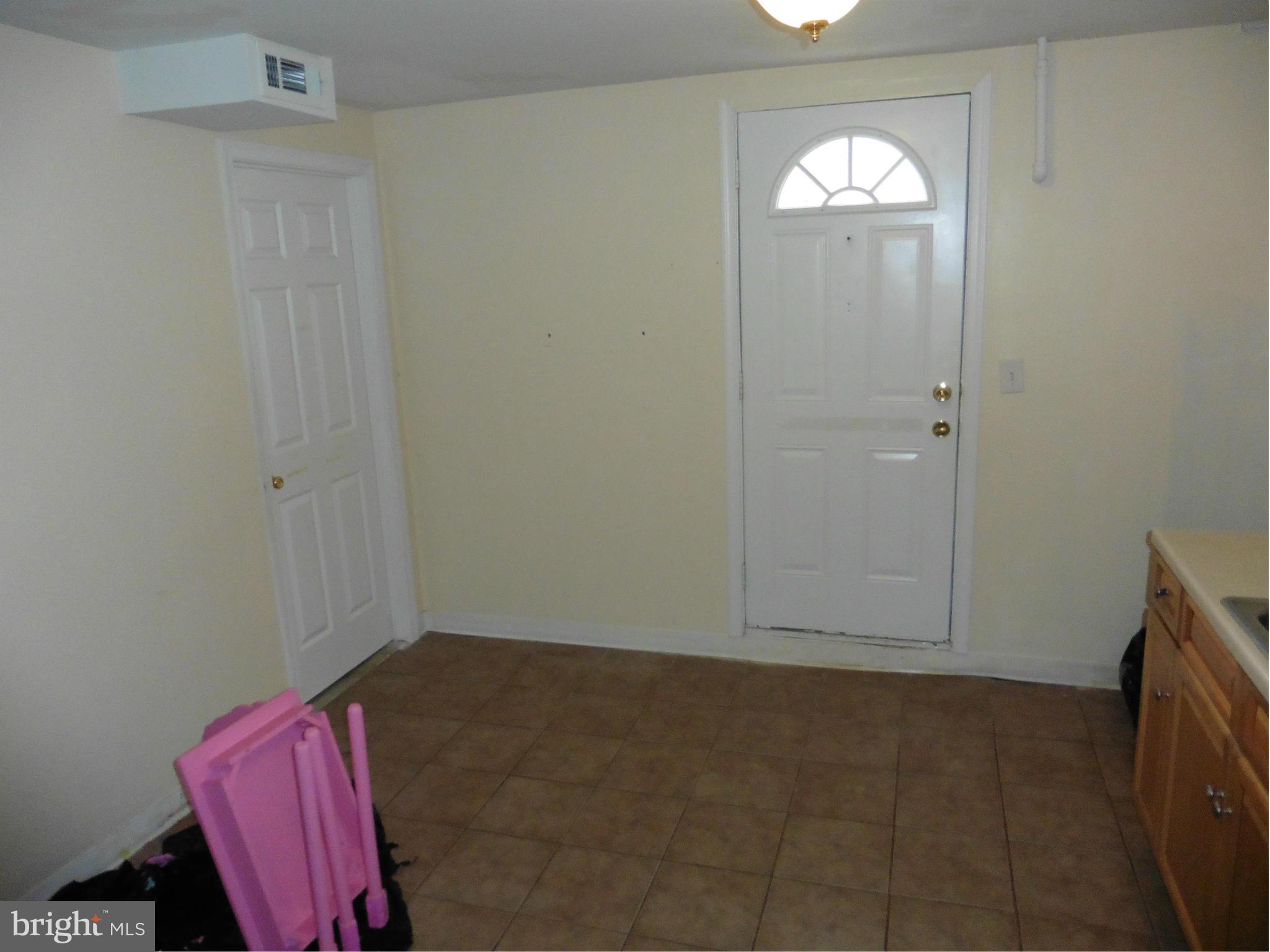 5227 Ravensworth Road Springfield, VA 22151 - Photo 25 of 27 an empty room with windows