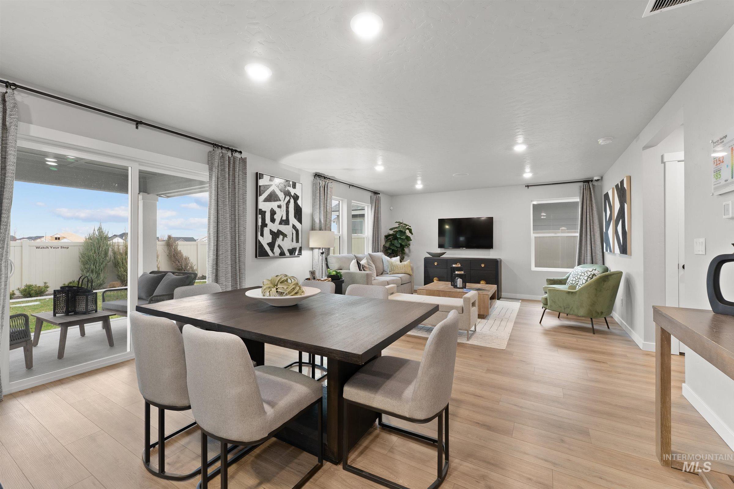 4141 South Colditz Way Meridian, ID 83642 - Photo 11 of 40 Dining space featuring light wood-type flooring and recessed lighting
