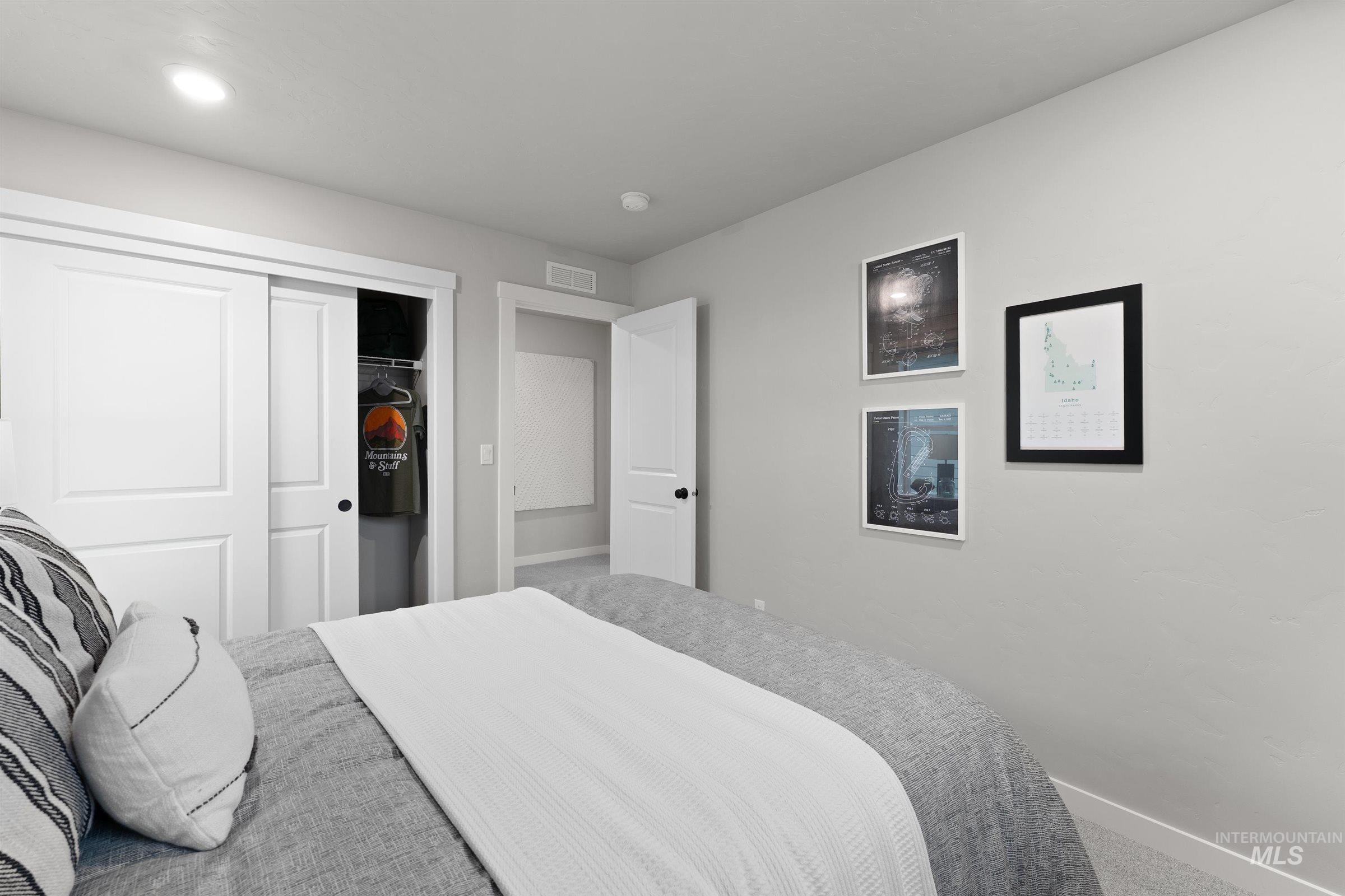 4141 South Colditz Way Meridian, ID 83642 - Photo 23 of 40 Carpeted bedroom with baseboards and a closet