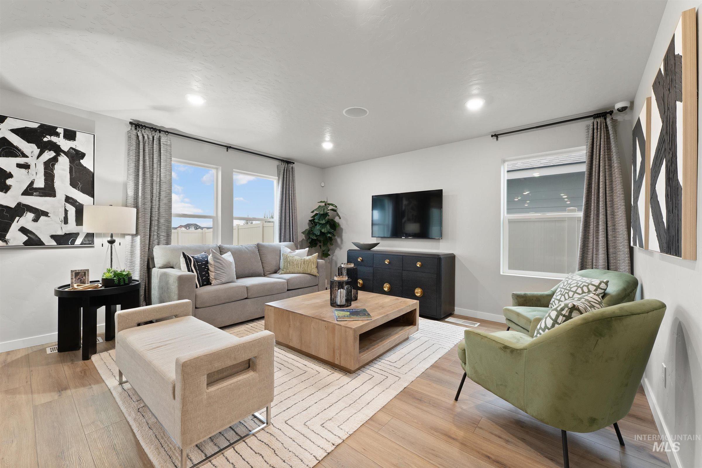 4141 South Colditz Way Meridian, ID 83642 - Photo 5 of 40 Living area with light wood-style floors and recessed lighting