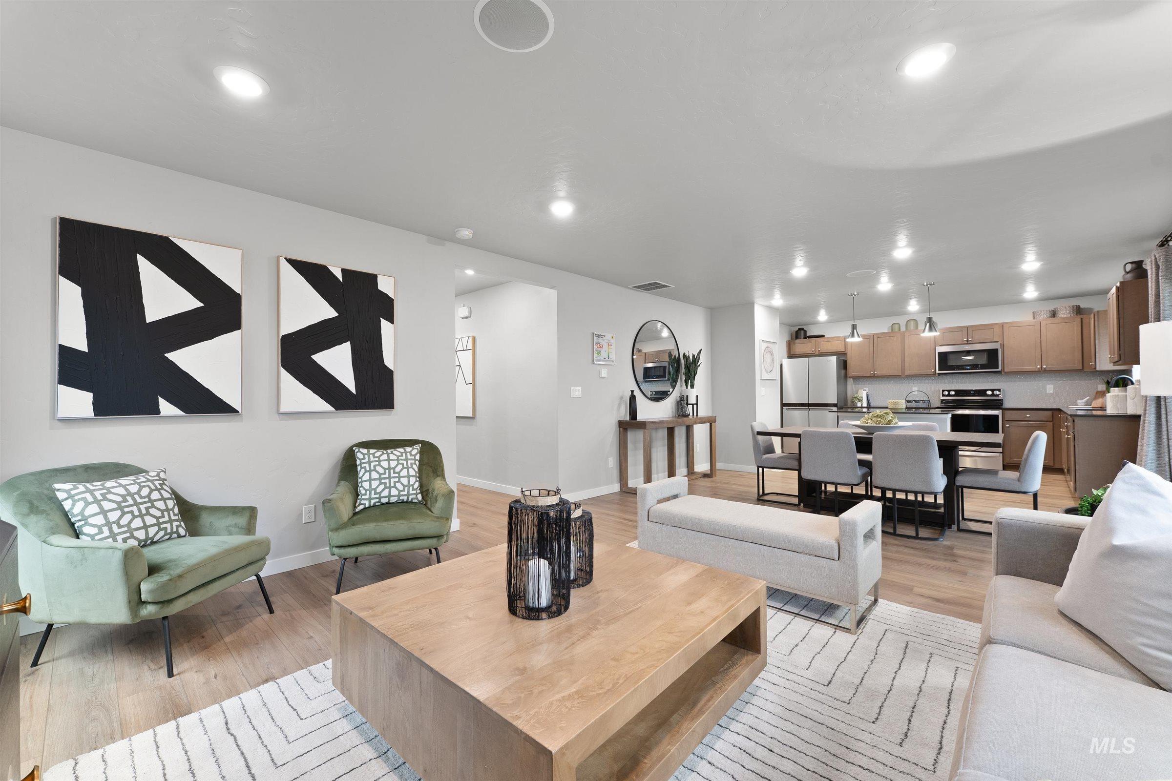 4141 South Colditz Way Meridian, ID 83642 - Photo 6 of 40 Living room featuring light wood-style floors and recessed lighting