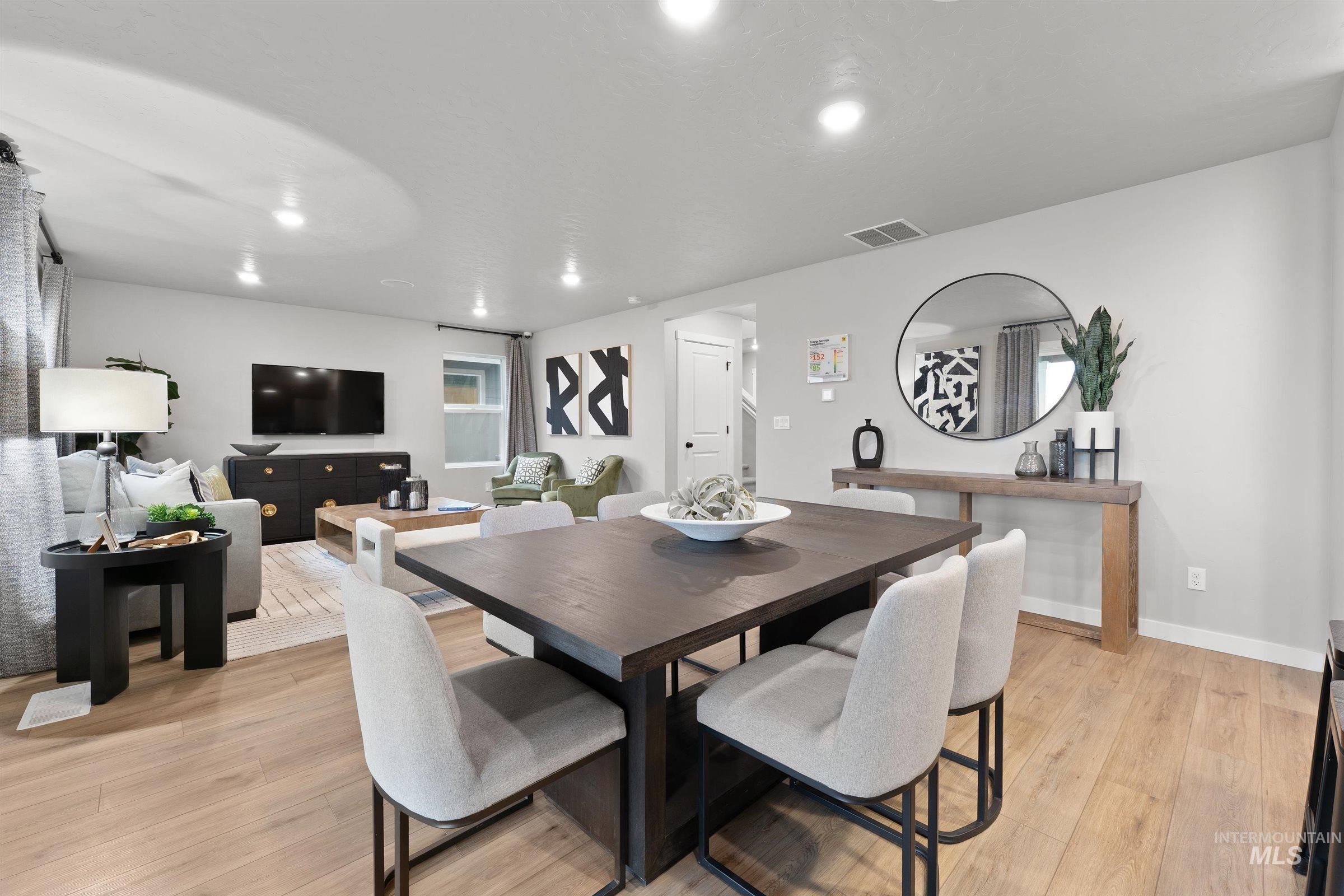 4141 South Colditz Way Meridian, ID 83642 - Photo 8 of 40 Dining area with light wood finished floors and recessed lighting