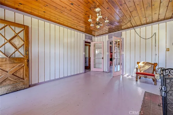 a view of a livingroom with furniture and a fireplace