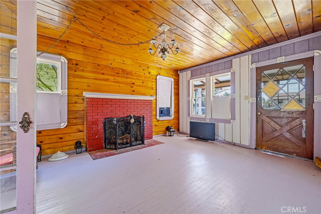 261 West 26th Street Merced, CA 95340 - Photo 22 of 40 a view of a livingroom with furniture and a fireplace