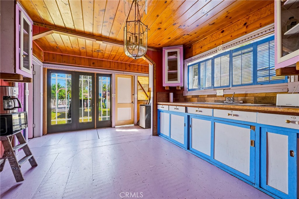 261 West 26th Street Merced, CA 95340 - Photo 23 of 40 a view of a house with a swimming pool