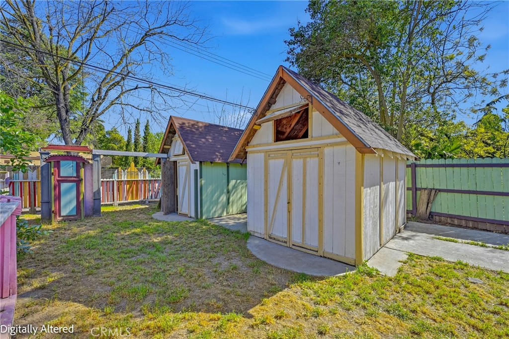 261 West 26th Street Merced, CA 95340 - Photo 40 of 40 a view of a small house with wooden fence