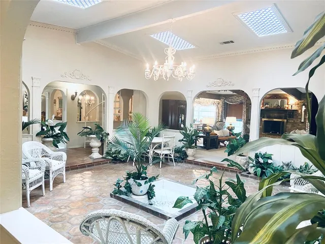a view of a living room and dining room