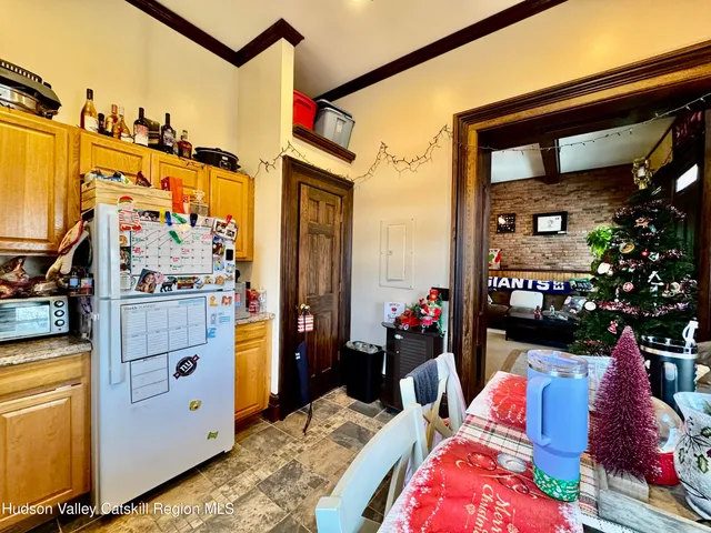 a very nice looking bedroom with a large bed and a chandelier