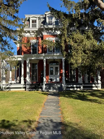 a view of a building with a swimming pool