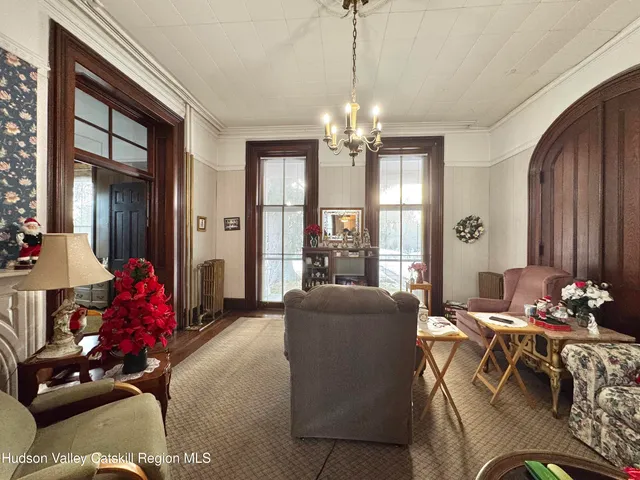 a view of living room and dining room