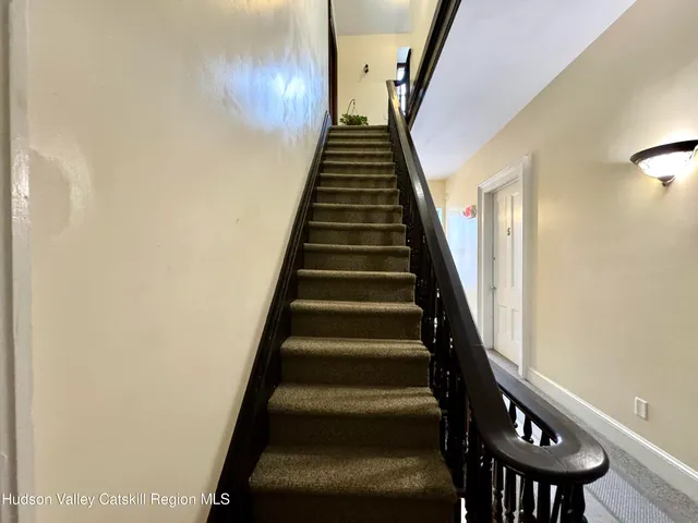 a kitchen that has a lot of cabinets in it