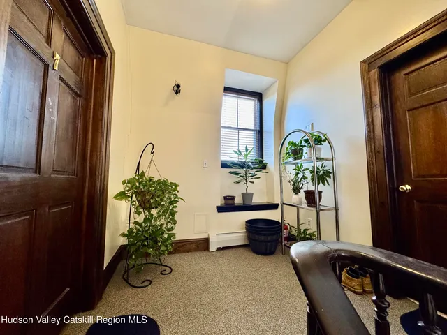 a front view of a building with street view