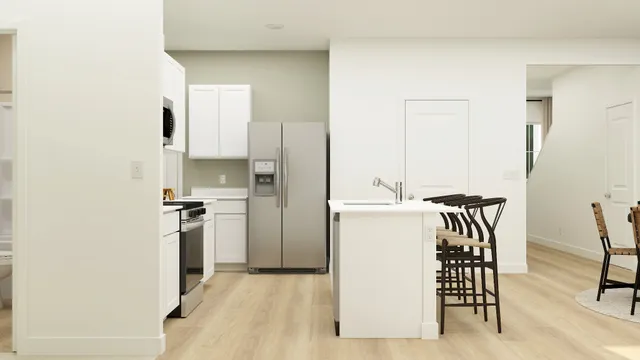 a kitchen with a refrigerator and a table